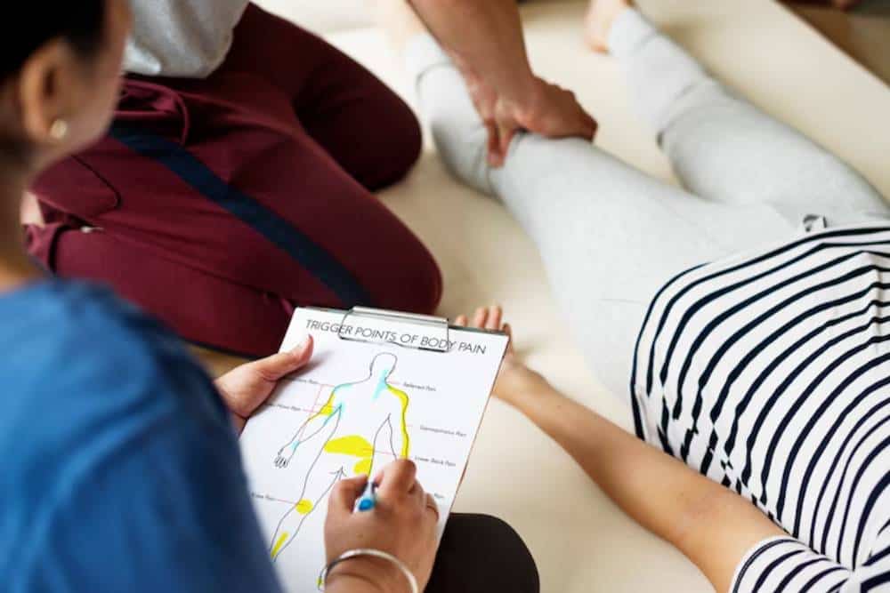 Medical professionals providing physical therapy support as part of holistic Opioid Addiction Treatment in Huntington Beach CA.
